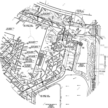 A detailed architectural site plan showcasing various labeled structures, pathways, measurements, and essential services.